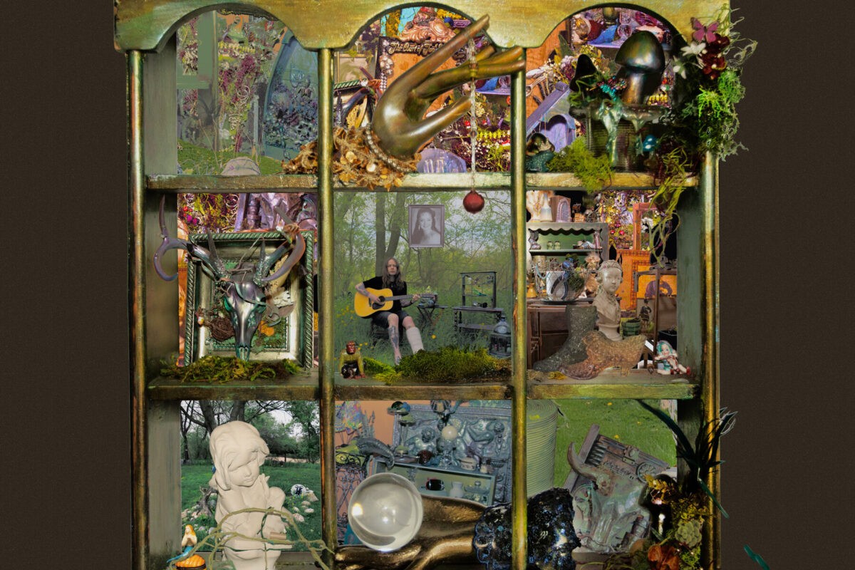 So Much For Goodbyes album cover, an assemblage artwork of a green and gold display cabinet filled with dioramas, gilded hands, mushrooms, moss and animal skulls, with a photograph of Billy Strings playing guitar on the middle shelf